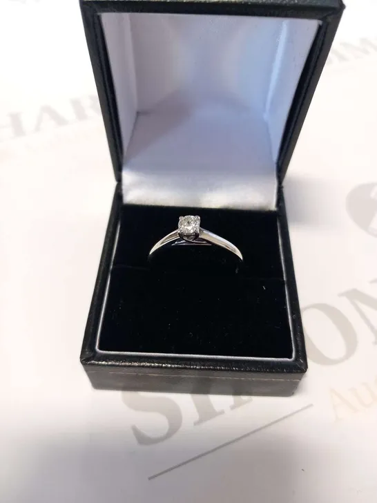 9CT WHITE GOLD SOLITAIRE RING SET WITH A NATURAL DIAMOND