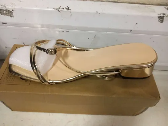 BOXED GOLD STRAP SHOES SIZE EU 42