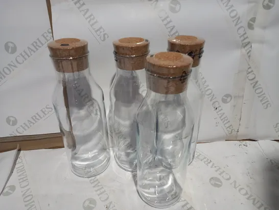 DESIGNER SET OF GLASS STORAGE JARS