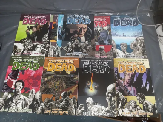 LOT OF 11 THE WALKING DEAD GRAPHIC NOVELS - VOLUMES 2/5/7/9/11/12/15/24/25/27/31