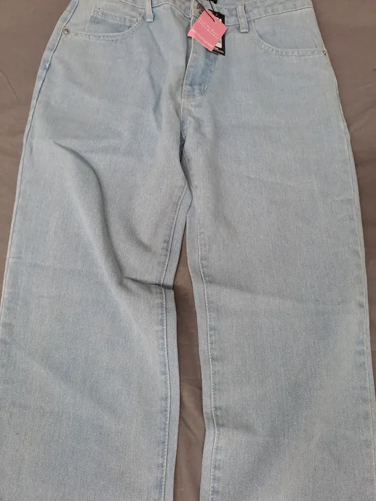 PRETTY LITTLE THING SHAPE WASHED BLUE DENIM STAR EMBOSSED JEANS SIZE 8