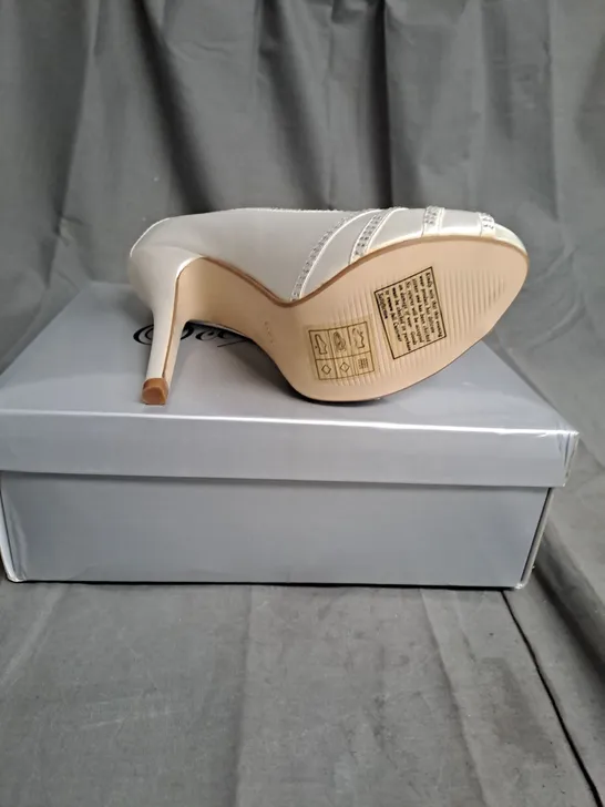 BOXED LOT OF 13 PAIRS OF LADIES OCCASIONS BY CASANDRA HIGH HEELED SHOES. VARIOUS SIZES