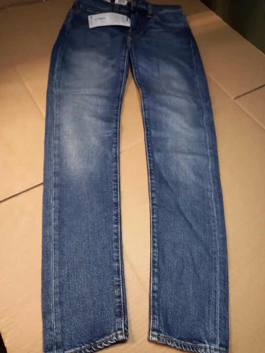 LEVI STAUSS & CO SKINNY TAPER BLUE JEANS - SIZE W28/L30