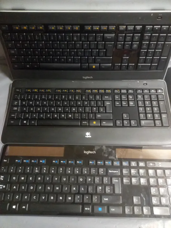 LOT OF 4 UNBOXED LOGITECH WIRELESS KEYBOARDS