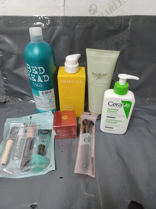 APPROXIMATELY 15 ASSORTED COSMETIC PRODUCTS TO INCLUDE BED HEAD TIGI SHAMPOO, CERAVE CLEANSER, AND AN ELF SKINCARE KIT ETC. 