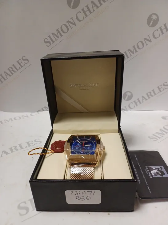 SWAN&EDGAR WIDE GOLDEN WATCH WITH BLUE FACE BOXED 