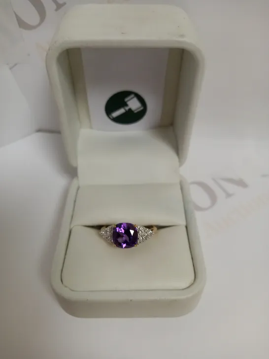 DESIGNER 9CT GOLD RING SET WITH A CUSHION CUT AMETHYST AND DIAMONDS WEIGHING +-1.58CT