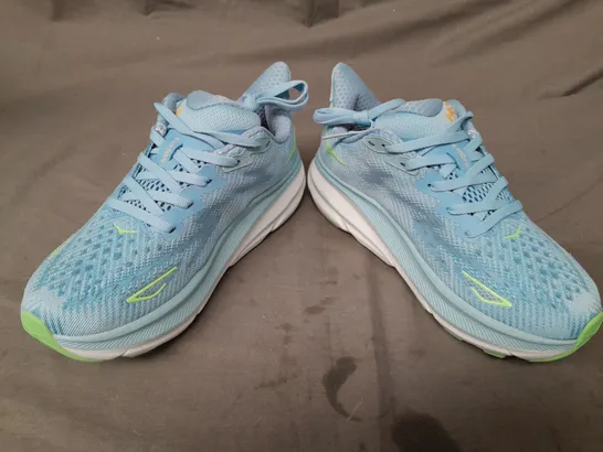 BOXED PAIR OF HOKA CLIFTON 9 SHOES IN LIGHT BLUE SIZE 3.5