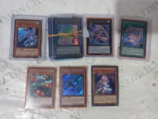 SMALL ASSORTMENT OF COLLECTIBLE YU-GI-OH TRADING CARDS