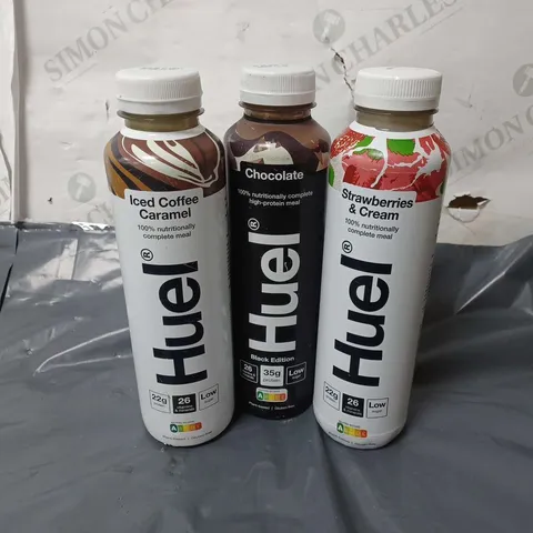 APPROXIMATELY 13 ASSORTED HUEL DRINKS TO INCLUDE CHOCOLATE BLACK EDITION (500ml), ICED COFFEE CARAMEL (500ml), STRAWBERRIES & CREAM (500ml), ETC - COLLECTION ONLY