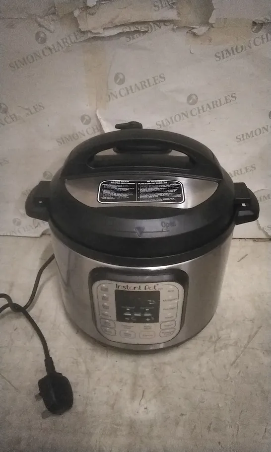 BOXED INSTANT POT  MULTI USE PRESSURE COOKER 