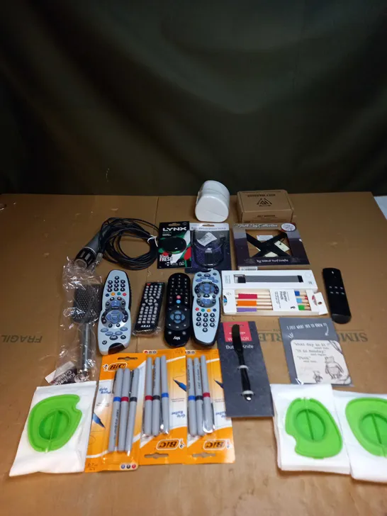 LOT OF ASSORTED ITEMS TO INCLUDE REMOTE CONTROLS, PENS AND PENCILS AND MICROPHONE