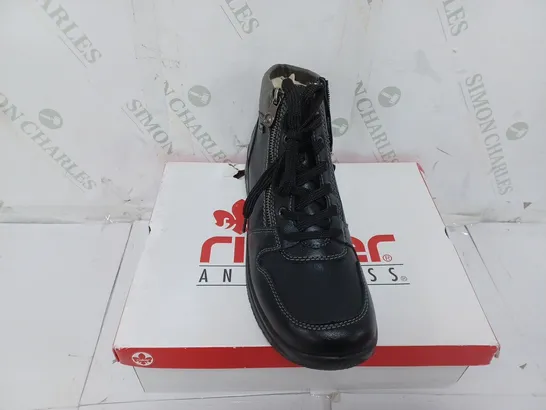 BOXED PAIR OF RIEKER WATER RESISTANT BOOTS IN BLACK SIZE 7.5 