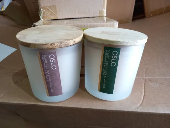 APPROXIMATELY 56 OSLO SCENTED CANDLES 350G TO INCLUDE; BERGAMOT AND PATCHULI AND WARM VANILA AND CEDAR