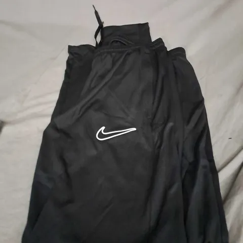 NIKE TRACKSUIT BOTTOMS SIZE M