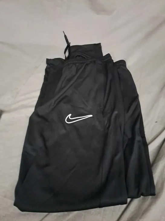 NIKE TRACKSUIT BOTTOMS SIZE M