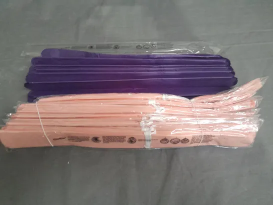 LARGE QUANTITY OF TISSUE PAPER DECORATIONS IN PURPLE AND PINK 