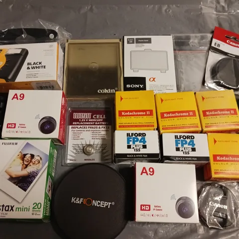 LOT OF APPROXIMATELY 18 ASSORTED CAMERA ACCESSORIES TO INCLUDE KODAK KODACHROME 2 FILM, INSTAX MINI SHEETS AND A9 IP CAMERA