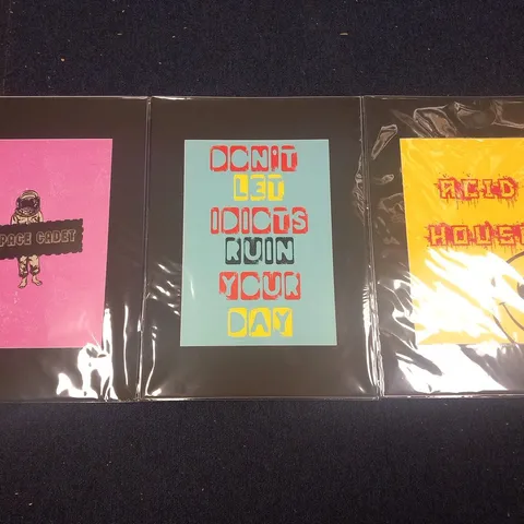 3 ASSORTED FAMOUS REBEL PRINTS TO INCLUDE; SPACE CADET, DON'T LET IDIOTS RUIN YOUR DAY AND ACID HOUSE