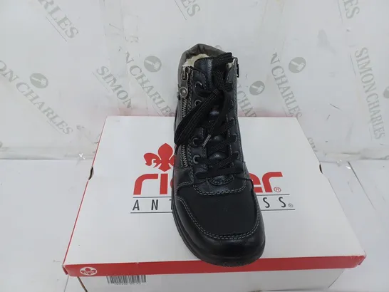 BOXED PAIR OF RIEKER WATER RESISTANT BOOTS IN BLACK SIZE 5