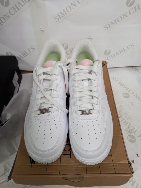 BOXED PAIR OF NIKE WHITE/PALECORAL AIR FORCE 1 '07 NEXT NATURE TRAINERS - UK 6.5