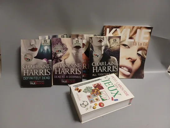 7 ASSORTED BOOKS TO INCLUDE KYLIE LA LA LA AND LIVING DEAD IN DALLAS BY CHARLAINE HARRIS 