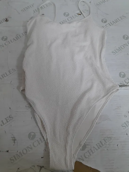 H&M STRECH BODY SUIT IN CREAM - UK 12