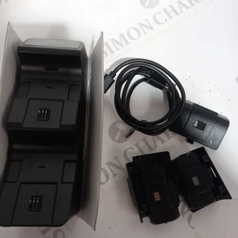 BOXED DUAL CONTROLLER CHARGER STATION WITH 2 BATTERIES AND 4 COVERS 