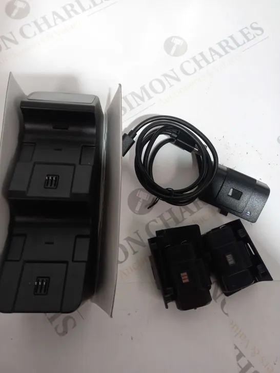 BOXED DUAL CONTROLLER CHARGER STATION WITH 2 BATTERIES AND 4 COVERS 