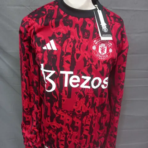 MANCHESTER UNITED PRE WARM TOP - UK XS