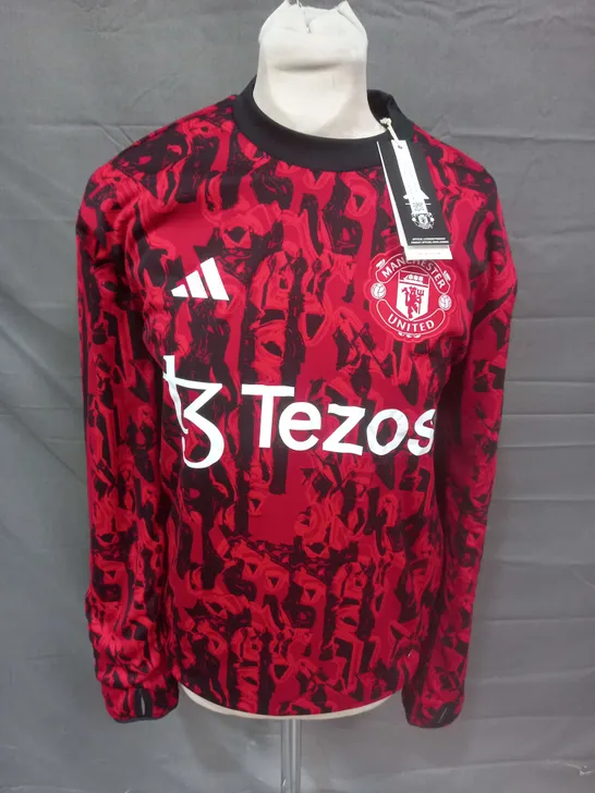 MANCHESTER UNITED PRE WARM TOP - UK XS