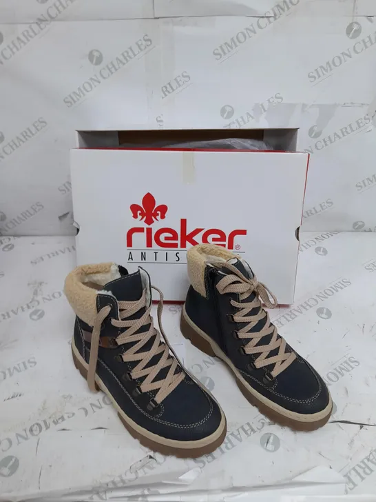 BOXED PAIR OF RIEKER LACE UP CHUNKY BOOTS IN NAVY SIZE 4