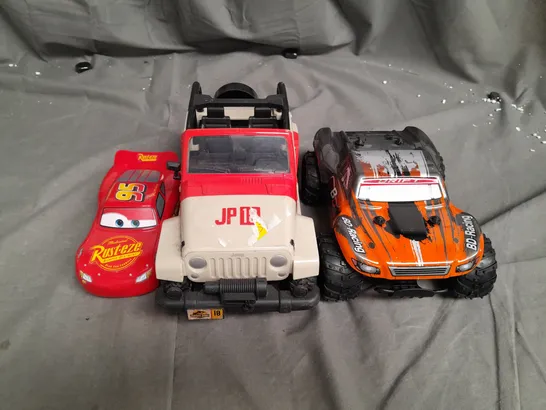 LOT OF 3 TOY RACE CARS TO INCLUDE LIGHTNING MCQUEEN, JURRASIC PARK JEEP AND BD RACING. 