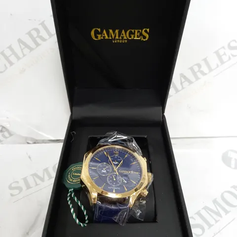 GAMAGES LONDON GRANDEUR GOLD & NAVY WATCH WITH LEATHER STRAP