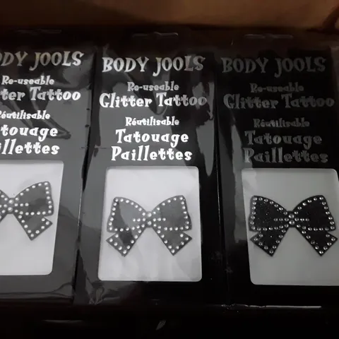 LOT OF APPROXIMATELY 200 PACKS OF BODY JOOLS BOW REUSABLE GLITTER TATTOOS 