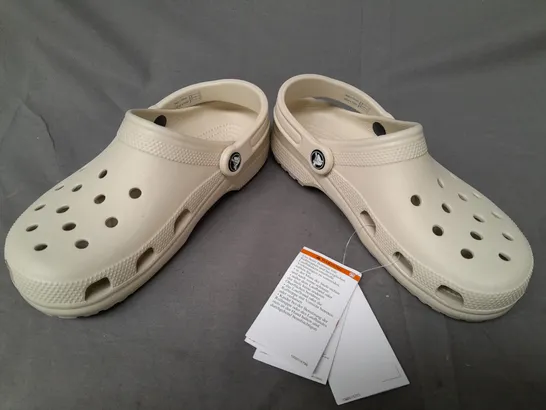 PAIR OF CROCS CLASSIC CLOGS IN BEIGE UK SIZE M5/W6