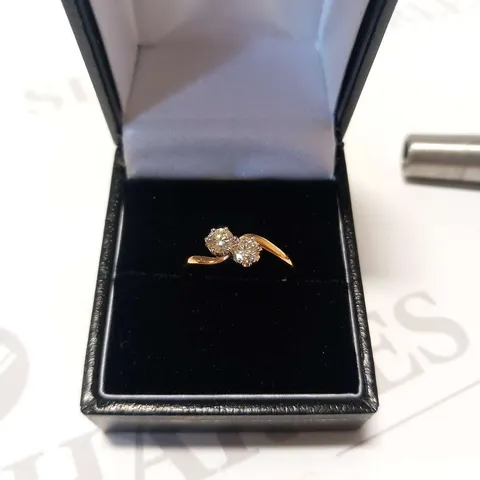 18CT GOLD TWIST RING SET WITH NATURAL DIAMONDS