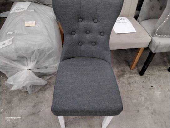 DESIGNER GREY FABRIC CHAIR WITH BUTTONED BACK AND WHITE LEGS