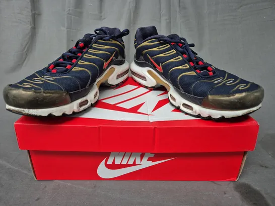 BOXED PAIR OF NIKE AIR TN SHOES IN NAVY/GOLD/RED UK SIZE 9.5