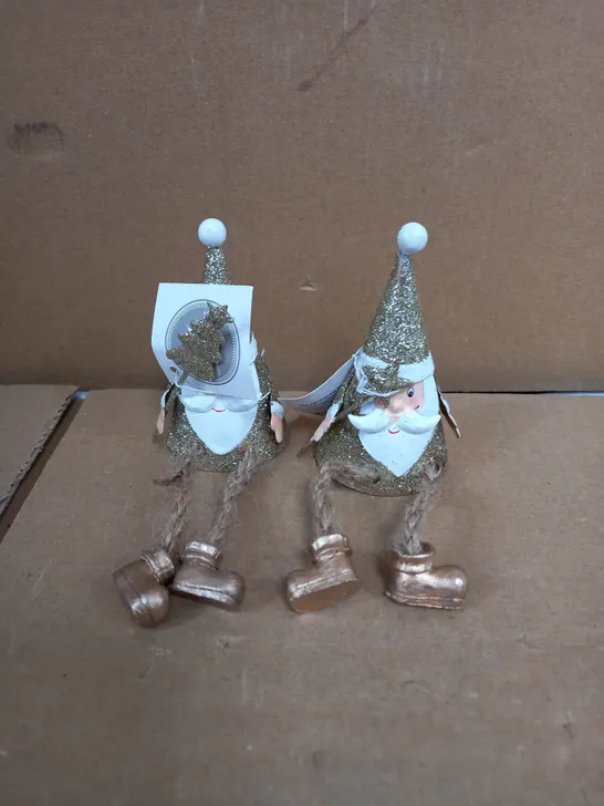 METAL SITTING SANTAS WITH DANGLY LEGS RRP £18