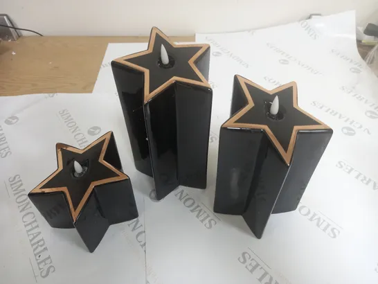 HOME REFLECTIONS PORCELAIN STAR PRE-LIT CANDLES SET OF 3 - BLACK