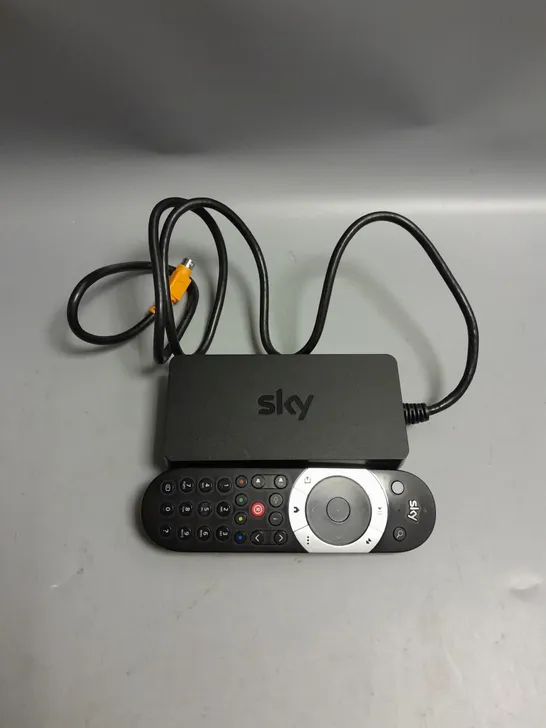 BOXED SKY TV REMOTE AND POWER SUPPLY