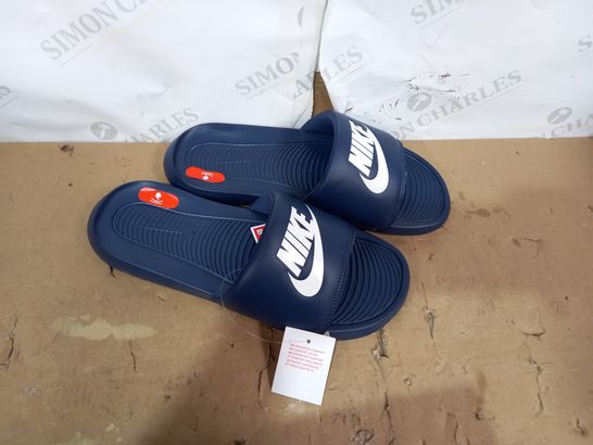 PAIR OF NIKE NAVY/WHITE SLIDERS SIZE 8