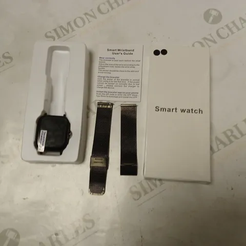 boxed smart watch with strap and instructions - black