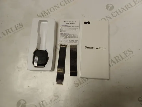 boxed smart watch with strap and instructions - black