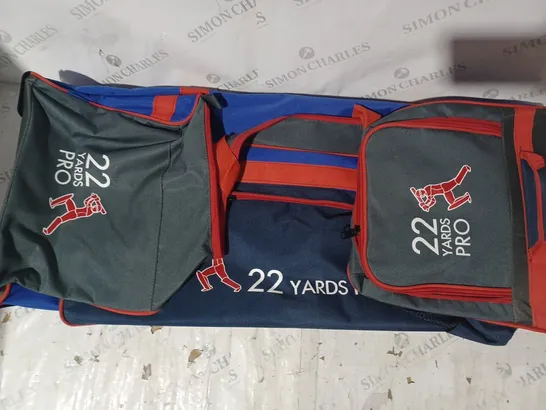 22 YARDS PRO WHEELIE CRICKET BAG IN NAVY/GREY/RED