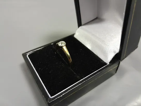 14CT GOLD SOLITAIRE RING RUB-OVER SET WITH NATURAL DIAMOND