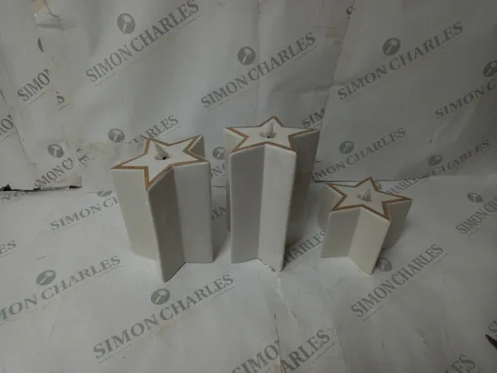 BOXED OUTLET HOME REFLECTIONS CERAMIC STAR PRE-LIT CANDLES