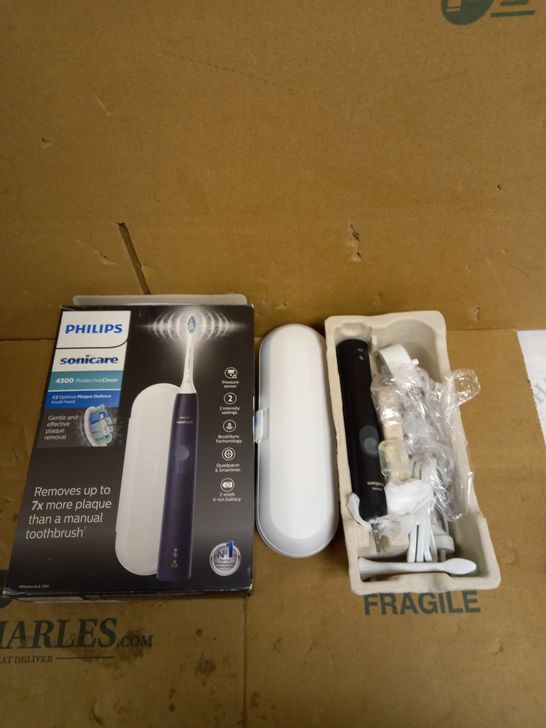 PHILIPS SONICARE RECHARGEABLE TOOTH BRUSH 