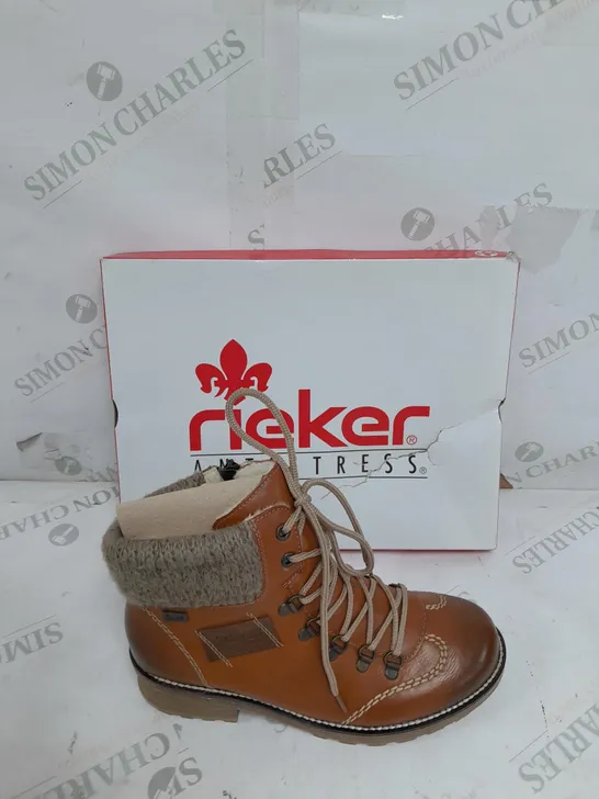 BOXED PAIR OF RIEKER WATER RESISTANT HIKING BOOTS IN BROWN ZIP UP SIZE 4